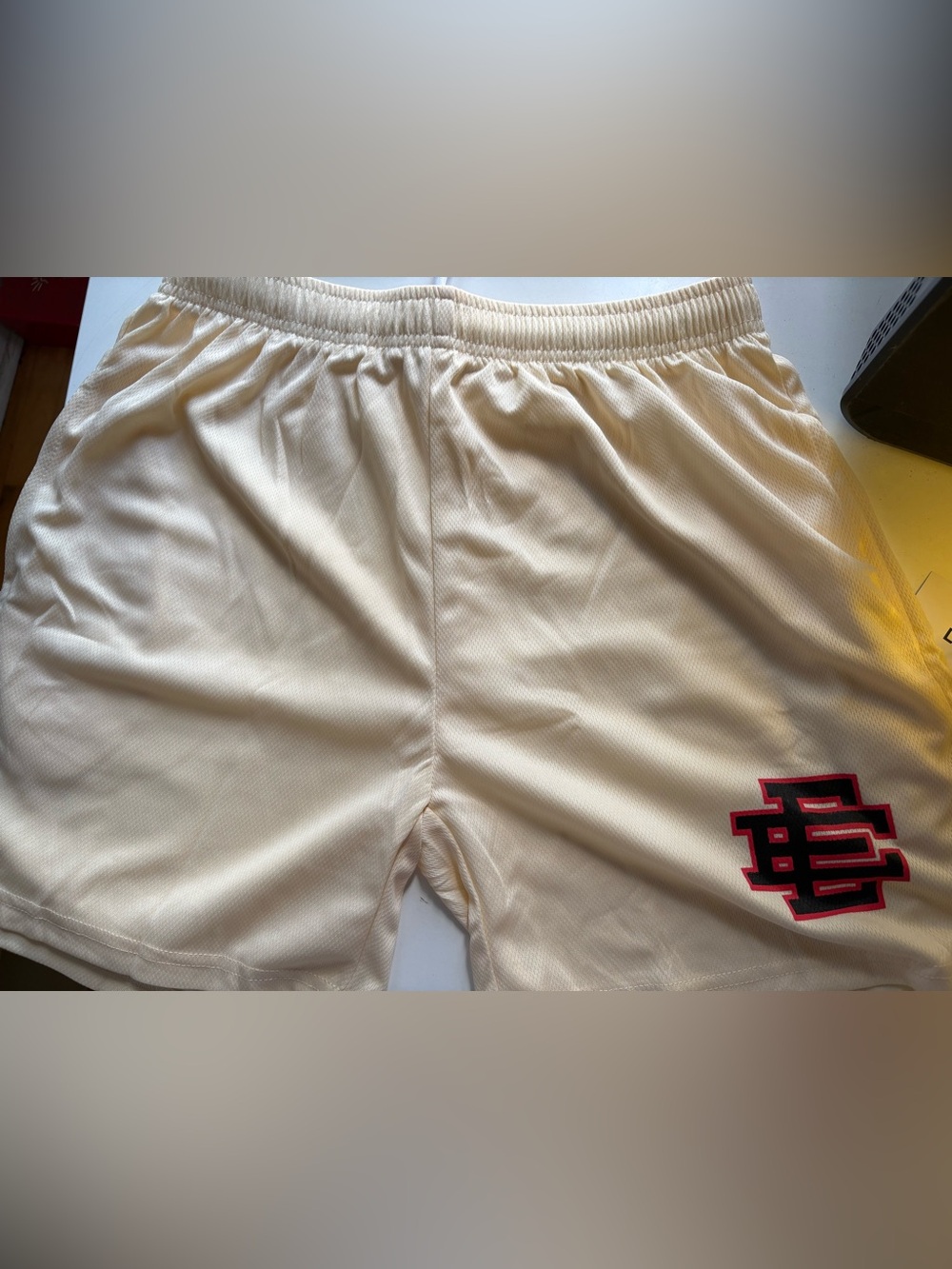 Eric Emanuel Cream Athletic Shorts with Black & Red Logo